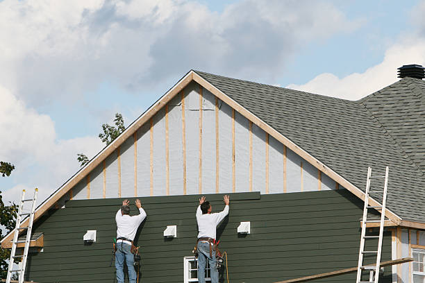 Professional Siding Replacement technician working in North Bend, OR